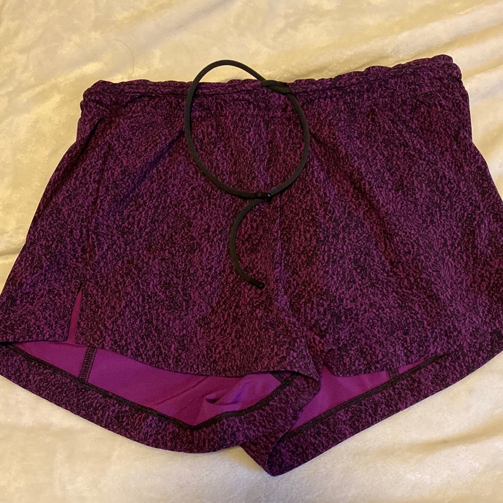 Lululemon size 4 purple with black speckles running shorts